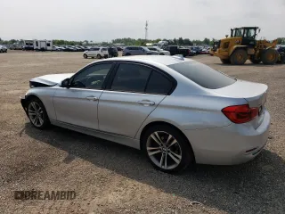 2018 BMW 3 Series 330i xDrive with VIN WBA8D9C54JEM34426, listed as a Copart auction lot 60487205 with 158,224 mi miles and Salvage title. Bid and sale history available at DreamBid. Image 2.