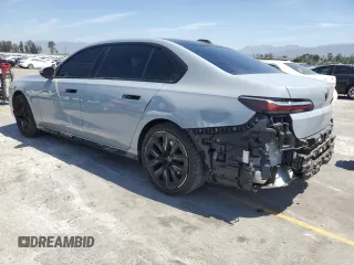2023 BMW 7 Series 740i with VIN WBA23EH05PCM61539, listed as a Copart auction lot 58013225 with 16,242 mi miles and Salvage title. Bid and sale history available at DreamBid. Image 2.