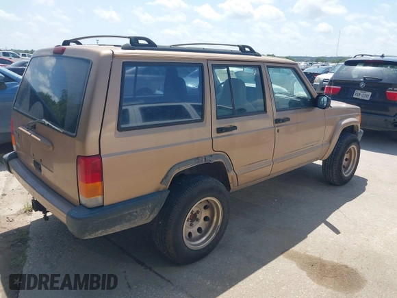 1999 Jeep Cherokee Sport with VIN 1J4FT68S1XL528885, listed as a IAAI auction lot 42536873 with Not provided miles and . Bid and sale history available at DreamBid. Image 4.