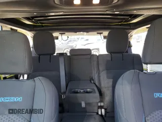 2024 Jeep Wrangler Rubicon z VIN 1C4RJXR64RW193946, wystawiony jako Copart lot #51693105 z przebiegiem 4 863 mil mil oraz Szkoda całkowita • Salvage title. Historia ofert i sprzedaży dostępna na DreamBid. Obrazek 10.