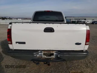 1998 Ford F-250 with VIN 1FTPX28L4WKA41149, listed as a Copart auction lot 84369654 with 430,187 mi miles and Salvage title. Bid and sale history available at DreamBid. Image 6.