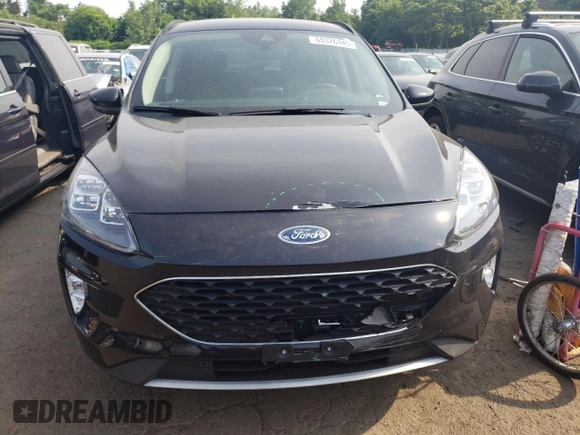 2020 Ford Escape Titanium z VIN 1FMCU9J97LUB25055, wystawiony jako Copart lot #60326945 z przebiegiem 78 711 mil mil oraz Szkoda całkowita • Salvage title. Historia ofert i sprzedaży dostępna na DreamBid. Obrazek 5.