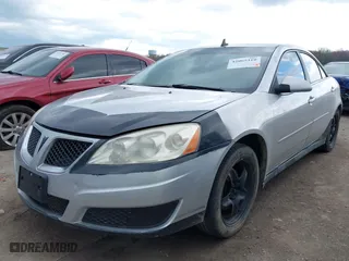 2010 Pontiac G6 w/1SA with VIN 1G2ZA5E02A4154217, listed as a IAAI auction lot 42065310 with 193,317 mi miles. Bid and sale history available at carsss.com. Image 2.