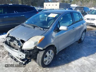2010 Toyota Yaris with VIN JTDKT4K32A5293998, listed as a IAAI auction lot 41635631 with 221,414 mi miles. Bid and sale history available at carsss.com. Image 18.