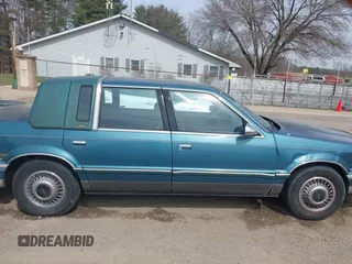 1993 Chrysler New Yorker z VIN 1C3XV66R5PD188692, wystawiony jako IAAI lot #41832600 z przebiegiem 146 380 mil mil oraz . Historia ofert i sprzedaży dostępna na DreamBid. Obrazek 13.