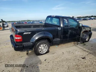 2007 Ford F-150 STX with VIN 1FTRF02297KD15057, listed as a Copart auction lot 73847974 with 184,413 mi miles and Salvage Title. Bid and sale history available at carsss.com. Image 3.