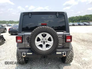2018 Jeep Wrangler Unlimited Sport z VIN 1C4HJXDG1JW225039, wystawiony jako Copart lot #58772725 z przebiegiem 80 839 mil mil oraz Szkoda całkowita • Salvage title. Historia ofert i sprzedaży dostępna na DreamBid. Obrazek 6.