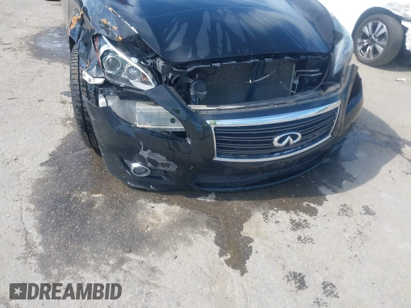 2013 Infiniti M with VIN JN1AY1AR6DM590187, listed as a IAAI auction lot 42096806 with 182,909 mi miles and . Bid and sale history available at DreamBid. Image 11.