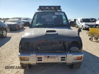 1996 Mitsubishi Montero z VIN H56A0209464, wystawiony jako Copart lot #76590414 z przebiegiem 112 578 mil mil oraz Szkoda całkowita • Salvage title. Historia ofert i sprzedaży dostępna na DreamBid. Obrazek 5.