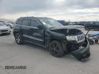 2011 Jeep Grand Cherokee Laredo z VIN 1J4RR4GG1BC520579, wystawiony jako Copart lot #60860794 z przebiegiem 196 271 mil mil oraz Szkoda całkowita • Salvage title. Historia ofert i sprzedaży dostępna na DreamBid. Obrazek 4.