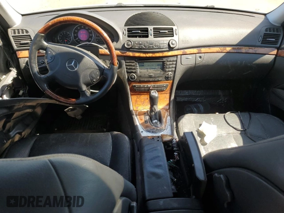 2003 Mercedes-Benz E-Class 3.2L with VIN WDBUF65JX3A096821, listed as a Copart auction lot 74378684 with 157,088 mi miles and Clean Title. Bid and sale history available at carsss.com. Image 8.