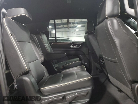 2023 Chevrolet Suburban Premier z VIN 1GNSCFKD4PR527765, wystawiony jako Copart lot #61022915 z przebiegiem 47 728 mil mil oraz Czysty tytuł • Clean title. Historia ofert i sprzedaży dostępna na DreamBid. Obrazek 11.