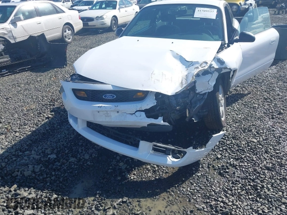 2003 Ford ZX2 ZX2 Standard z VIN 3FAFP113X3R119236, wystawiony jako IAAI lot #41709537 z przebiegiem 141 460 mil mil oraz . Historia ofert i sprzedaży dostępna na DreamBid. Obrazek 6.