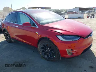2016 Tesla Model X 70D with VIN 5YJXCAE27GF021994, listed as a IAAI auction lot 41976475 with 70,771 mi miles. Bid and sale history available at carsss.com. Image 1.