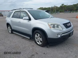 2009 GMC Acadia SLT2 with VIN 1GKEV33D89J156855, listed as a IAAI auction lot 40816119 with 166,057 mi miles. Bid and sale history available at carsss.com. Image 1.
