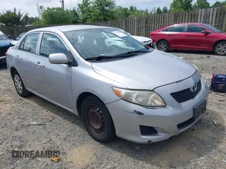 2009 Toyota Corolla with VIN 1NXBU40E89Z128911, listed as a IAAI auction lot 42714988 with 215,416 mi miles and . Bid and sale history available at DreamBid. Image 1.