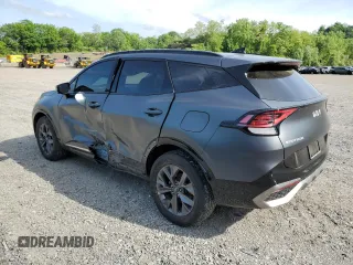 2023 Kia Sportage SX-Prestige with VIN KNDPXCAG9P7044605, listed as a Copart auction lot 56915705 with 43,294 mi miles and Salvage title. Bid and sale history available at DreamBid. Image 2.
