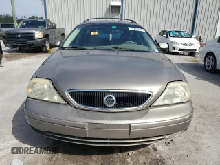 2003 Mercury Sable LS Premium z VIN 1MEFM59S03A606329, wystawiony jako Copart lot #79331624 z przebiegiem 152 059 mil mil oraz Nie do naprawy. Historia ofert i sprzedaży dostępna na DreamBid. Obrazek 5.