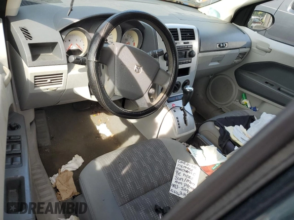 2007 Dodge Caliber SXT z VIN 1B3HB48B57D364154, wystawiony jako Copart lot #58973225 z przebiegiem 205 693 mil mil oraz Szkoda całkowita • Salvage title. Historia ofert i sprzedaży dostępna na DreamBid. Obrazek 8.