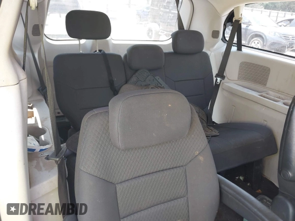 2010 Dodge Grand Caravan SE with VIN 2D4RN4DE6AR339734, listed as a IAAI auction lot 40086879 with 221,062 mi miles and . Bid and sale history available at DreamBid. Image 8.
