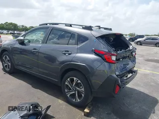 2024 Subaru Crosstrek Premium с VIN JF2GUADC1R8912214, выставлен на аукционе IAAI как лот 42502904 с пробегом 8 047 миль миль и . История ставок и продаж доступна на DreamBid. Изображение 3.