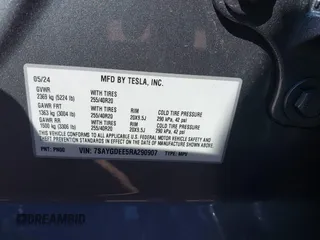 2024 Tesla Model Y Long Range with VIN 7SAYGDEE5RA290907, listed as a IAAI auction lot 41705170 with 4,099 mi miles. Bid and sale history available at carsss.com. Image 9.