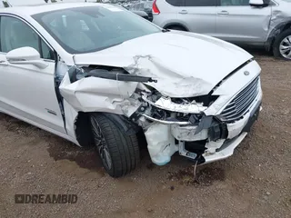 2017 Ford Fusion Titanium with VIN 3FA6P0SU2HR379834, listed as a IAAI auction lot 42440382 with 55,646 mi miles and . Bid and sale history available at DreamBid. Image 6.