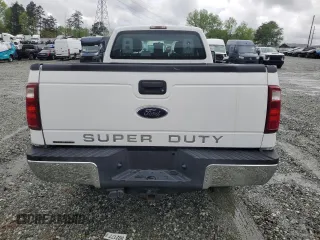 2015 Ford F-250 XLT with VIN 1FT7X2B6XFEA74111, listed as a Copart auction lot 52918695 with 114,522 mi miles and Salvage title. Bid and sale history available at DreamBid. Image 6.