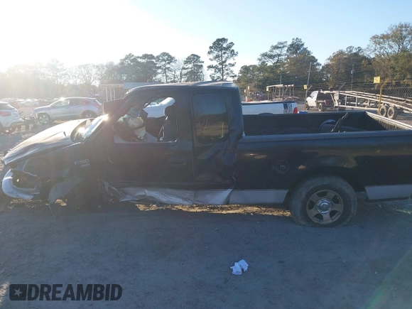 2003 Ford F-150 XL with VIN 1FTRX17W73NA09918, listed as a IAAI auction lot 41296725 with 1 mi miles. Bid and sale history available at carsss.com. Image 13.