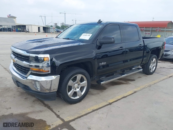 2018 Chevrolet Silverado 1500 LT with VIN 3GCPCREC5JG557884, listed as a IAAI auction lot 41889798 with 112,668 mi miles. Bid and sale history available at carsss.com. Image 17.