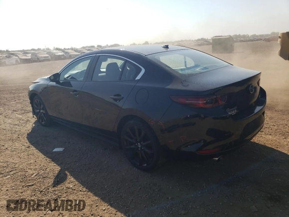 2021 Mazda 3 2.5 Turbo with VIN JM1BPBAY1M1311585, listed as a Copart auction lot 71673614 with 12,452 mi miles and Salvage Title. Bid and sale history available at DreamBid. Image 2.