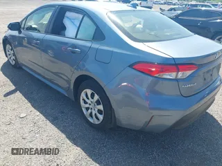 2023 Toyota Corolla LE z VIN JTDB4MEE7PJ002731, wystawiony jako IAAI lot #42155242 z przebiegiem 53 394 mil mil oraz . Historia ofert i sprzedaży dostępna na DreamBid. Obrazek 3.