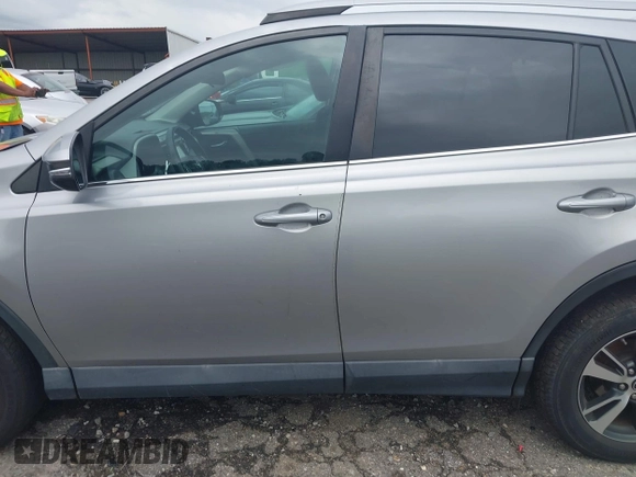 2018 Toyota RAV4 XLE with VIN 2T3WFREV4JW486939, listed as a IAAI auction lot 42355448 with 133,655 mi miles and . Bid and sale history available at DreamBid. Image 14.
