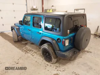 2019 Jeep Wrangler Unlimited Sport Altitude with VIN 1C4HJXDG0KW617379, listed as a IAAI auction lot 42005517 with 91,296 mi miles and . Bid and sale history available at DreamBid. Image 3.