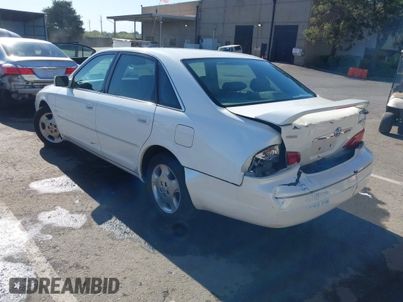 2004 Toyota Avalon XL z VIN 4T1BF28B54U362005, wystawiony jako IAAI lot #42174414 z przebiegiem 378 173 mil mil oraz . Historia ofert i sprzedaży dostępna na DreamBid. Obrazek 3.
