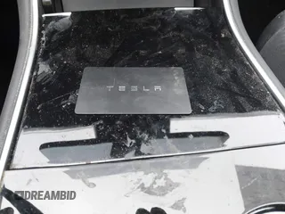 2018 Tesla Model 3 Long Range Battery with VIN 5YJ3E1EA6JF052659, listed as a IAAI auction lot 42093903 with 49,255 mi miles and . Bid and sale history available at DreamBid. Image 11.