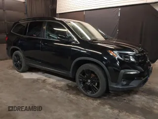 2021 Honda Pilot Special Edition with VIN 5FNYF6H27MB047009, listed as a IAAI auction lot 41838224 with 30,000 mi miles. Bid and sale history available at carsss.com. Image 1.