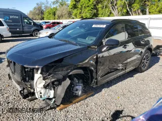 2024 Cadillac XT4 FWD Sport with VIN 1GYFZER42RF123404, listed as a Copart auction lot 49824615 with 7,972 mi miles and Salvage title. Bid and sale history available at DreamBid. Image 1.