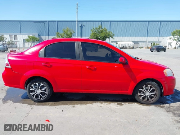 2011 Chevrolet Aveo 1LT z VIN KL1TD5DE0BB151956, wystawiony jako IAAI lot #42083842 z przebiegiem 115 607 mil mil oraz . Historia ofert i sprzedaży dostępna na DreamBid. Obrazek 13.