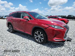 2021 Lexus RX 350L with VIN JTJHZKEA6M2018970, listed as a Copart auction lot 58027705 with 65,070 mi miles and Salvage title. Bid and sale history available at DreamBid. Image 4.