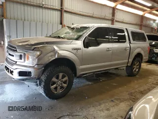 2020 Ford F-150 XL with VIN 1FTEW1E57LKF44499, listed as a Copart auction lot 60336735 with 156,745 mi miles and Salvage title. Bid and sale history available at DreamBid. Image 1.