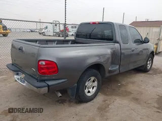 2003 Ford F-150 XL with VIN 1FTRX07W33KB50920, listed as a IAAI auction lot 41742906 with 100,560 mi miles and . Bid and sale history available at DreamBid. Image 4.