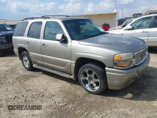 2002 GMC Yukon Denali z VIN 1GKEK63U52J202688, wystawiony jako IAAI lot #41778920 z przebiegiem 354 202 mil mil oraz . Historia ofert i sprzedaży dostępna na DreamBid. Obrazek 1.