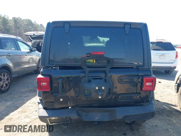 2020 Jeep Wrangler Unlimited Black and Tan with VIN 1C4HJXDGXLW219078, listed as a IAAI auction lot 41783437 with 59,137 mi miles and . Bid and sale history available at DreamBid. Image 17.