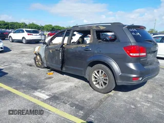 2015 Dodge Journey SXT with VIN 3C4PDCBB6FT591109, listed as a IAAI auction lot 40943676 with Not Provided miles. Bid and sale history available at carsss.com. Image 3.
