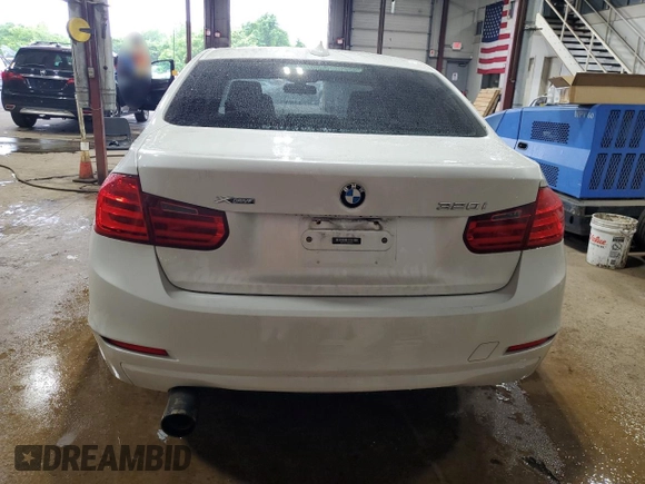 2013 BMW 3 Series 320i xDrive with VIN WBA3C3C5XDF982732, listed as a Copart auction lot 62852385 with 134,466 mi miles and Salvage title. Bid and sale history available at DreamBid. Image 6.
