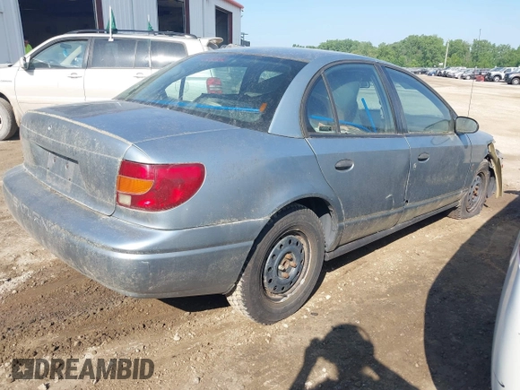 2002 Saturn SL z VIN 1G8ZH52832Z275788, wystawiony jako IAAI lot #42465553 z przebiegiem Nie podano mil oraz . Historia ofert i sprzedaży dostępna na DreamBid. Obrazek 4.