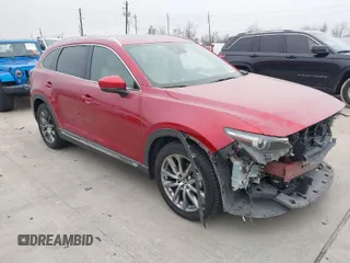 2018 Mazda CX-9 Grand Touring z VIN JM3TCADYXJ0213704, wystawiony jako IAAI lot #41422216 z przebiegiem 169 541 mil mil oraz . Historia ofert i sprzedaży dostępna na DreamBid. Obrazek 1.