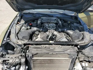 2017 BMW M6 z VIN WBS6E9C53HG437414, wystawiony jako Copart lot #61141685 z przebiegiem 89 893 mil mil oraz Szkoda całkowita • Salvage title. Historia ofert i sprzedaży dostępna na DreamBid. Obrazek 11.