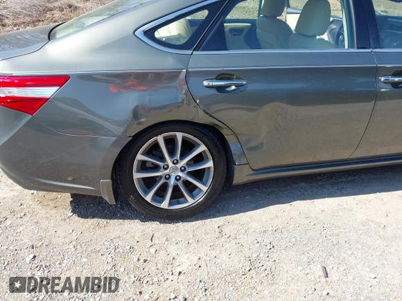 2014 Toyota Avalon Limited z VIN 4T1BK1EB0EU118032, wystawiony jako IAAI lot #41864586 z przebiegiem 72 477 mil mil oraz . Historia ofert i sprzedaży dostępna na DreamBid. Obrazek 6.
